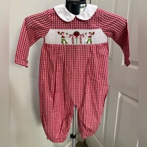 Festive Red Checkered Outfit. Fits like a 4T/5T.  Buttons in back, snaps on legs